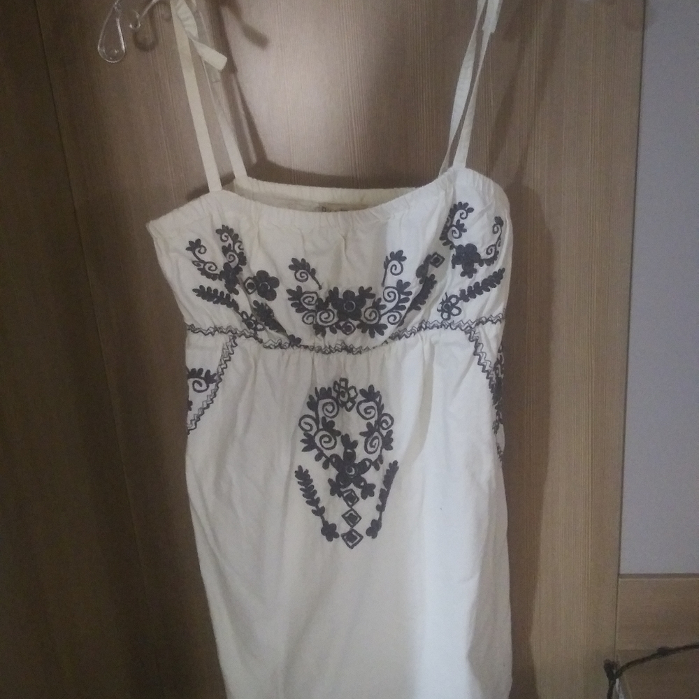 Shoulder strapped top.